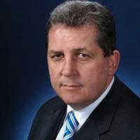 Senator the Hon Christopher Evans